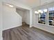 Dining room with hardwood floors and view of entryway at 110 Shining Amber Way, Franklinton, NC 27525