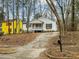 White house with red door and small porch at 116 Culbreth Cir, Chapel Hill, NC 27516