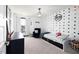 Modern bedroom features triangle wallpaper and decorative accents at 147 E Wellesley Dr, Clayton, NC 27520