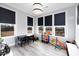 Bright playroom with ample windows, wood floors, and a versatile space for activities and play at 147 E Wellesley Dr, Clayton, NC 27520
