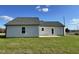 House exterior with gray siding and a patio at 19 Shiloh Dr, Lillington, NC 27546