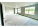 Large bedroom featuring lots of light and gray carpeting at 217 Lake Edge Dr, Lillington, NC 27546