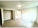 Bedroom with neutral carpeting and closet space at 217 Lake Edge Dr, Lillington, NC 27546
