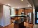 Kitchen features stainless steel appliances and a large island at 302 Glenview Ln, Durham, NC 27703