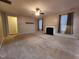 Spacious living room featuring hardwood floors and a fireplace at 302 Glenview Ln, Durham, NC 27703