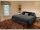 Spacious bedroom with king-size bed and wood floors at 322 Mccauley St, Chapel Hill, NC 27516