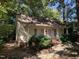 Yellow cottage with double front doors and landscaping at 322 Mccauley St, Chapel Hill, NC 27516