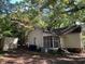 Back exterior view with storage shed and screened porch at 322 Mccauley St, Chapel Hill, NC 27516