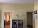 Bright hallway with built-in shelving and access to other rooms at 322 Mccauley St, Chapel Hill, NC 27516