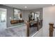 Loft area with exercise equipment and built-in media console at 371 Fosterton Cottage Way, Raleigh, NC 27603