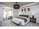 Spacious main bedroom with plush carpet and stylish decor at 371 Fosterton Cottage Way, Raleigh, NC 27603