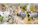 Aerial view showing house, driveway, and surrounding trees at 516 Argyll Dr, Sanford, NC 27332
