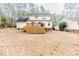 Large backyard with deck and spacious grassy area at 516 Argyll Dr, Sanford, NC 27332