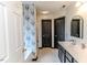 Modern bathroom with double vanity and dark cabinets at 516 Argyll Dr, Sanford, NC 27332
