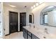 Modern bathroom with double vanity and dark cabinets at 516 Argyll Dr, Sanford, NC 27332