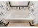 Bathroom with garden tub and floral wallpaper at 516 Argyll Dr, Sanford, NC 27332
