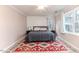 Spacious bedroom with king-size bed and patterned rug at 516 Argyll Dr, Sanford, NC 27332