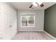 Bedroom with double-door closet and window at 516 Argyll Dr, Sanford, NC 27332