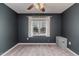 Bright bedroom with window and ceiling fan at 516 Argyll Dr, Sanford, NC 27332