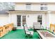 Deck with seating area, fire pit, and access to backyard at 516 Argyll Dr, Sanford, NC 27332