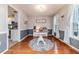 Bright dining room with hardwood floors and round table at 516 Argyll Dr, Sanford, NC 27332