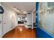 Hardwood floors and view into living room with fireplace at 516 Argyll Dr, Sanford, NC 27332