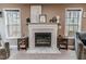 Elegant marble fireplace in the living room at 516 Argyll Dr, Sanford, NC 27332
