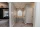 Upper hallway with arched window and light fixture at 516 Argyll Dr, Sanford, NC 27332