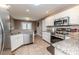 Updated kitchen, featuring stainless steel appliances and granite countertops at 516 Argyll Dr, Sanford, NC 27332