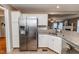 Modern kitchen with stainless steel appliances and granite countertops at 516 Argyll Dr, Sanford, NC 27332