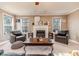 Bright living room with fireplace and ample seating at 516 Argyll Dr, Sanford, NC 27332