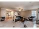 Living room with fireplace, comfortable seating and natural light at 516 Argyll Dr, Sanford, NC 27332