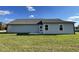 Charming single story home with gray siding and a small patio at 57 Shiloh Dr, Lillington, NC 27546