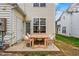 Patio with wooden table and chairs at 5734 Corbon Crest Ln, Raleigh, NC 27612