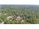 Wide aerial view of the neighborhood and surrounding trees at 6548 English Oaks Dr, Raleigh, NC 27615