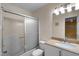 Bathroom with granite vanity, shower/tub combo, and single sink at 6548 English Oaks Dr, Raleigh, NC 27615