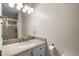 Bathroom with granite vanity, single sink, and shower at 6548 English Oaks Dr, Raleigh, NC 27615