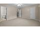 Bedroom with carpet, ceiling fan, and access to bathroom at 6548 English Oaks Dr, Raleigh, NC 27615