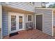 Small deck with two chairs and access to the backyard at 6548 English Oaks Dr, Raleigh, NC 27615