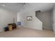 Living room with laminate floors and staircase at 6548 English Oaks Dr, Raleigh, NC 27615