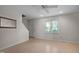 Bright living room with laminate floors and ceiling fan at 6548 English Oaks Dr, Raleigh, NC 27615