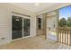 Relaxing screened porch with wooden deck, perfect for outdoor enjoyment at 72 Demascus Way, Four Oaks, NC 27524