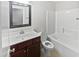 Bathroom with tub, toilet and vanity at 917 Palm Ct, Mebane, NC 27302