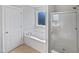 Bathroom boasts a soaking tub and a shower stall at 917 Palm Ct, Mebane, NC 27302