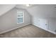 Cozy bedroom with carpet flooring and window at 917 Palm Ct, Mebane, NC 27302