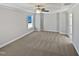 Bright bedroom featuring neutral walls and ceiling fan at 917 Palm Ct, Mebane, NC 27302