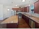 Kitchen with granite countertops and stainless steel appliances at 917 Palm Ct, Mebane, NC 27302