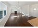 Spacious living room with hardwood floors and fireplace at 917 Palm Ct, Mebane, NC 27302
