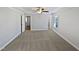 Spacious main bedroom with carpeted floor and neutral colored walls at 917 Palm Ct, Mebane, NC 27302