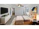 Virtually staged main bedroom with a large bed and ample closet space at 917 Palm Ct, Mebane, NC 27302
